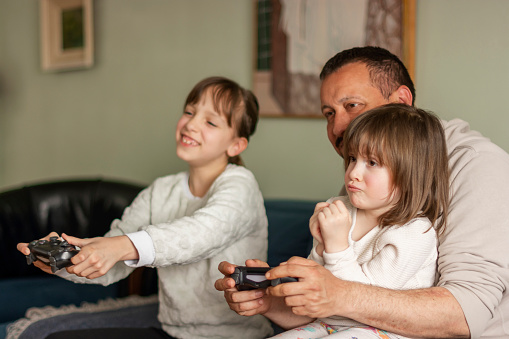 Modern gaming setup with console and controllers for rent